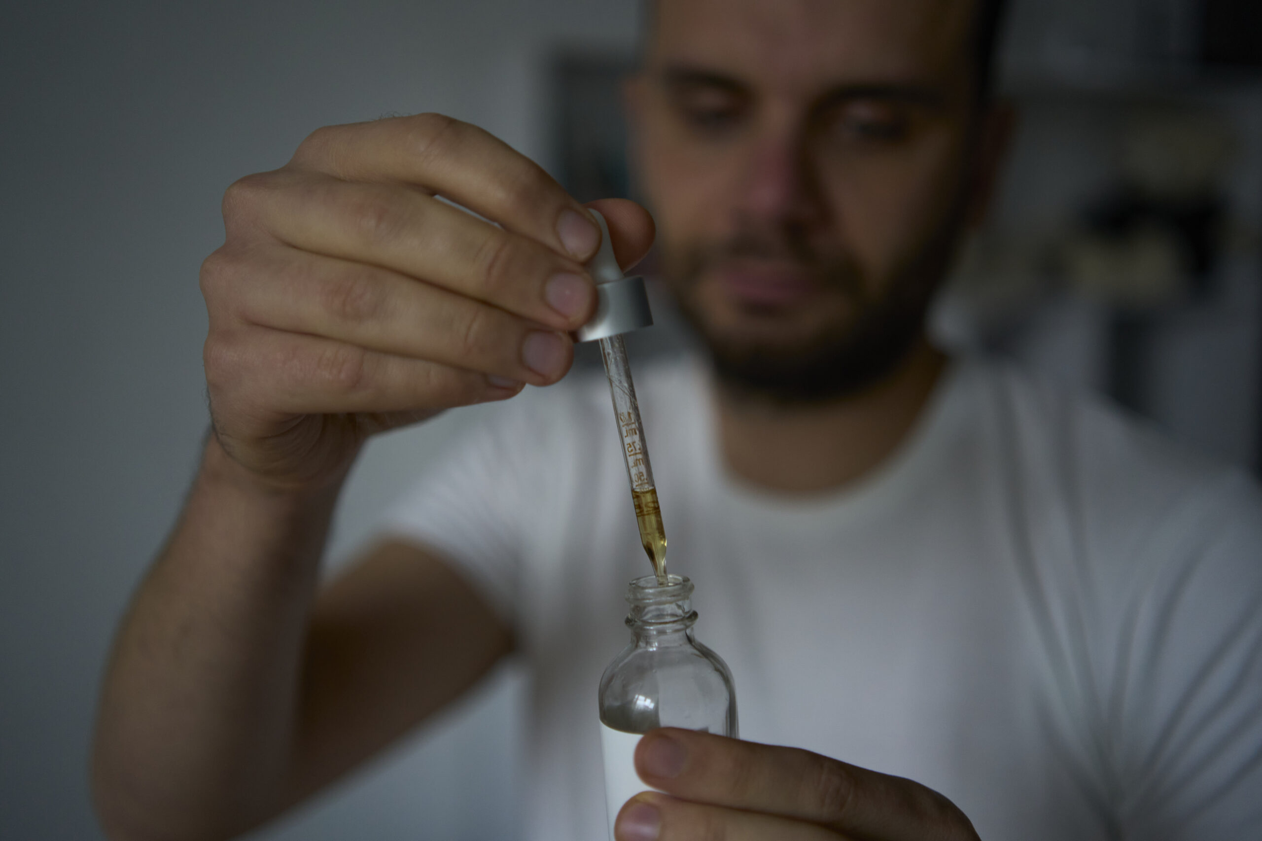 Man wondering about minoxidil side effects