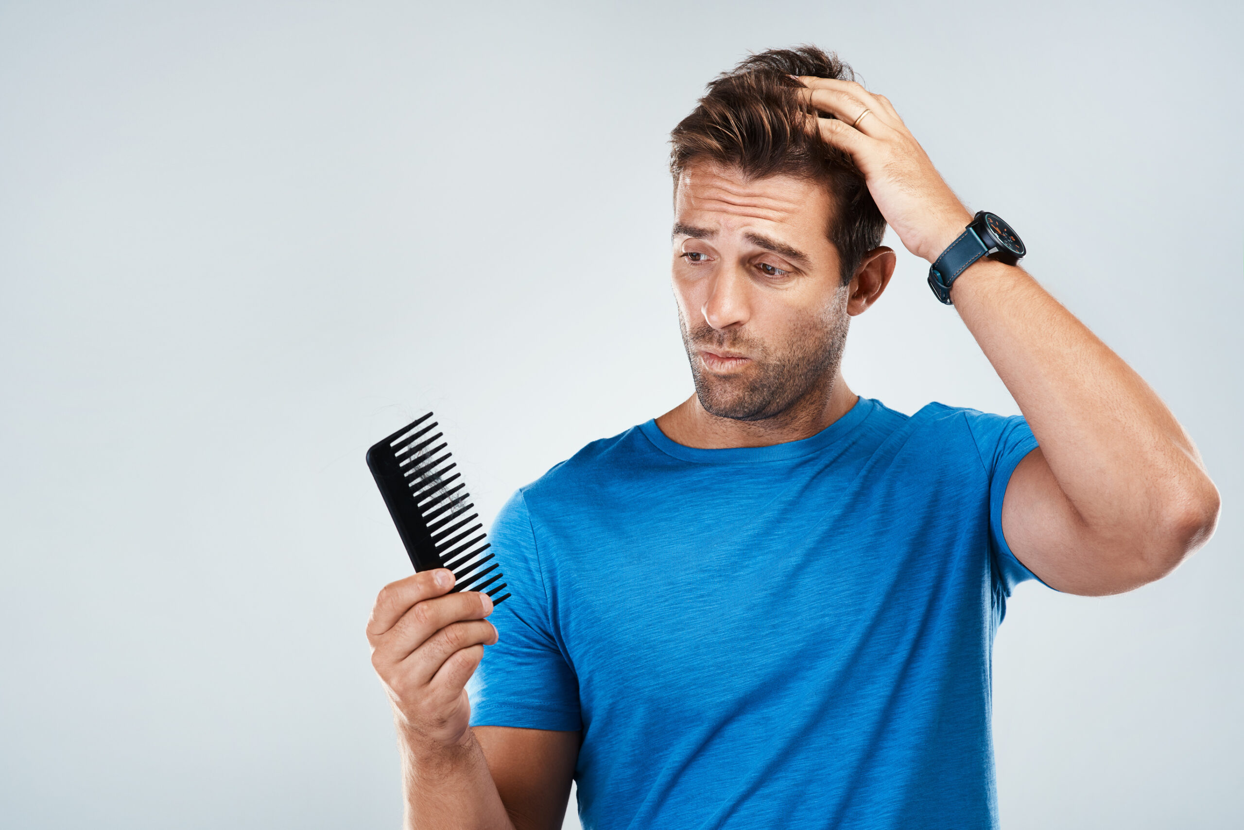 Man worried about minoxidil hair loss
