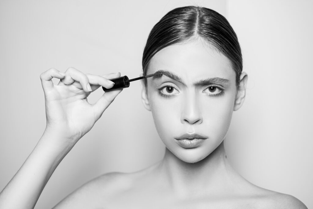 woman wondering about minoxidil side effects for eyebrows